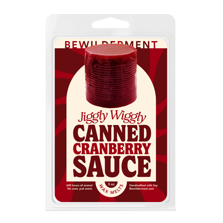 Pack of red cranberry sauce scented wax melts in a white clamshell container labeled Jiggly Wiggly Canned Cranberry Sauce.