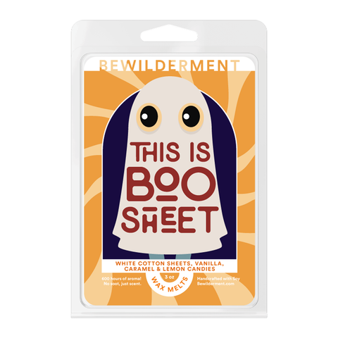 White wax melts pack with cartoon ghost and orange sunburst background labeled This Is Boo Sheet.