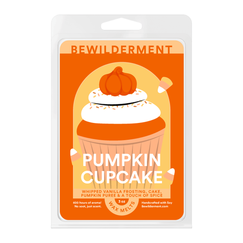 Pumpkin cupcake-shaped wax melts with white frosting and a small pumpkin decoration on top in orange packaging.